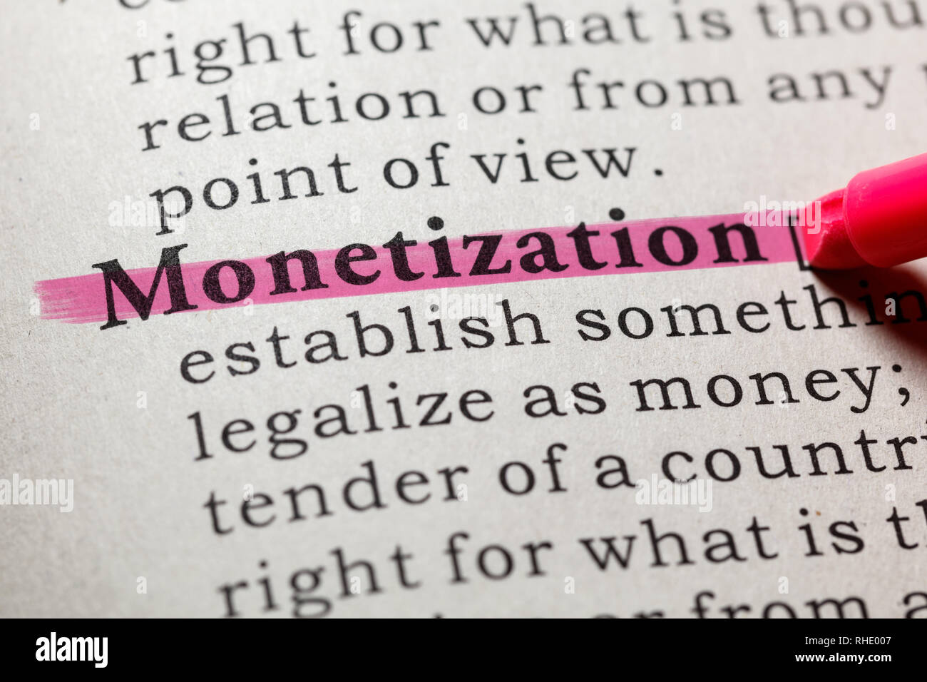 Fake Wörterbuch, Wörterbuch Definition des Wortes Monetarisierung. Einschließlich der wichtigsten beschreibende Wörter. Stockfoto
