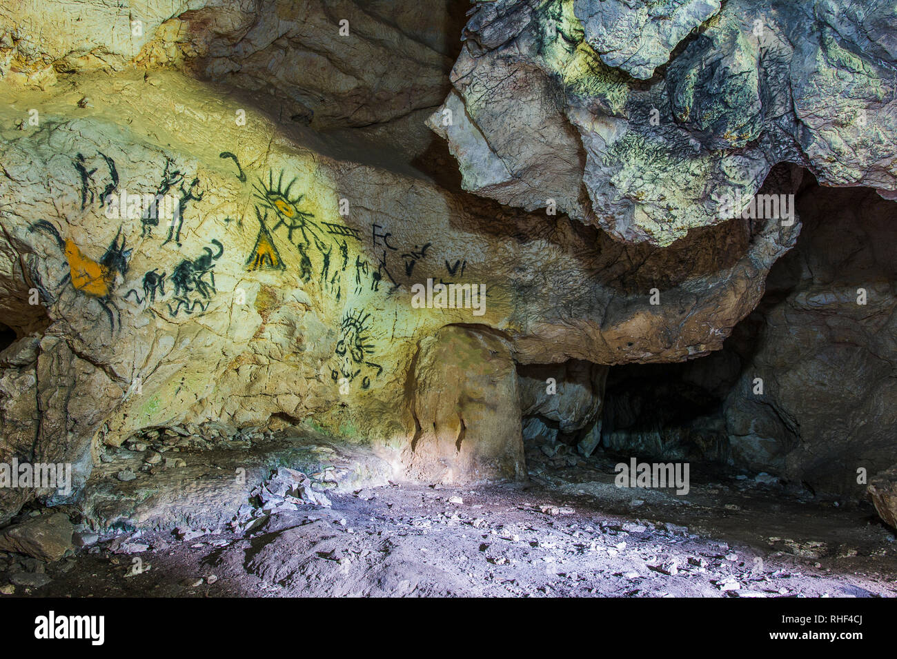 Zeichnung einer alten Stein alter Mann in einer Höhle. Prähistorische Malerei. Stockfoto
