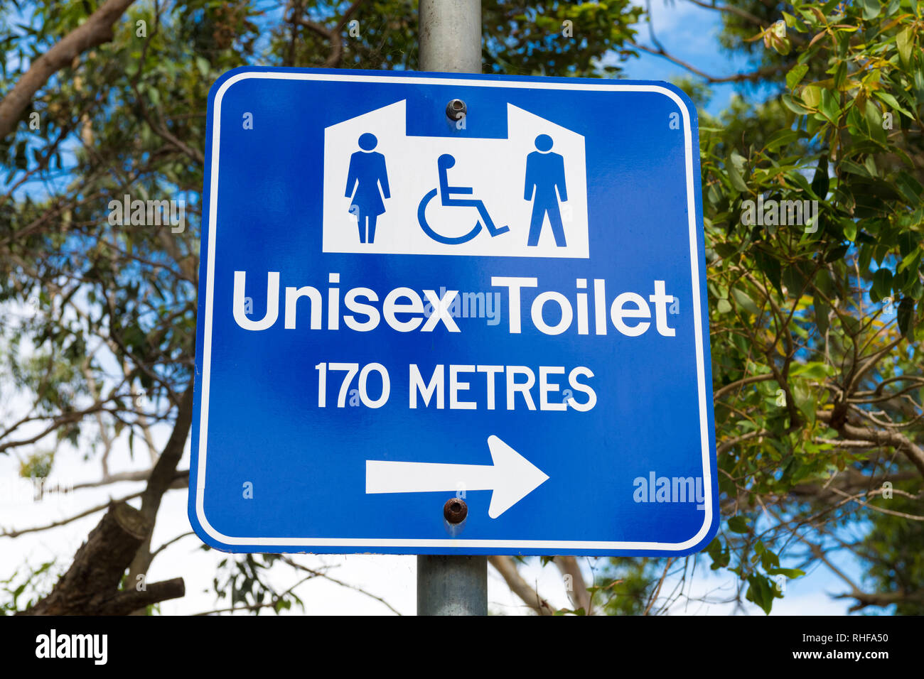 Huskisson, NSW, Australia-December 22, 2018: Unisex wc direktionale Zeichen in der Stadt von Huskisson, NSW, Australien Stockfoto