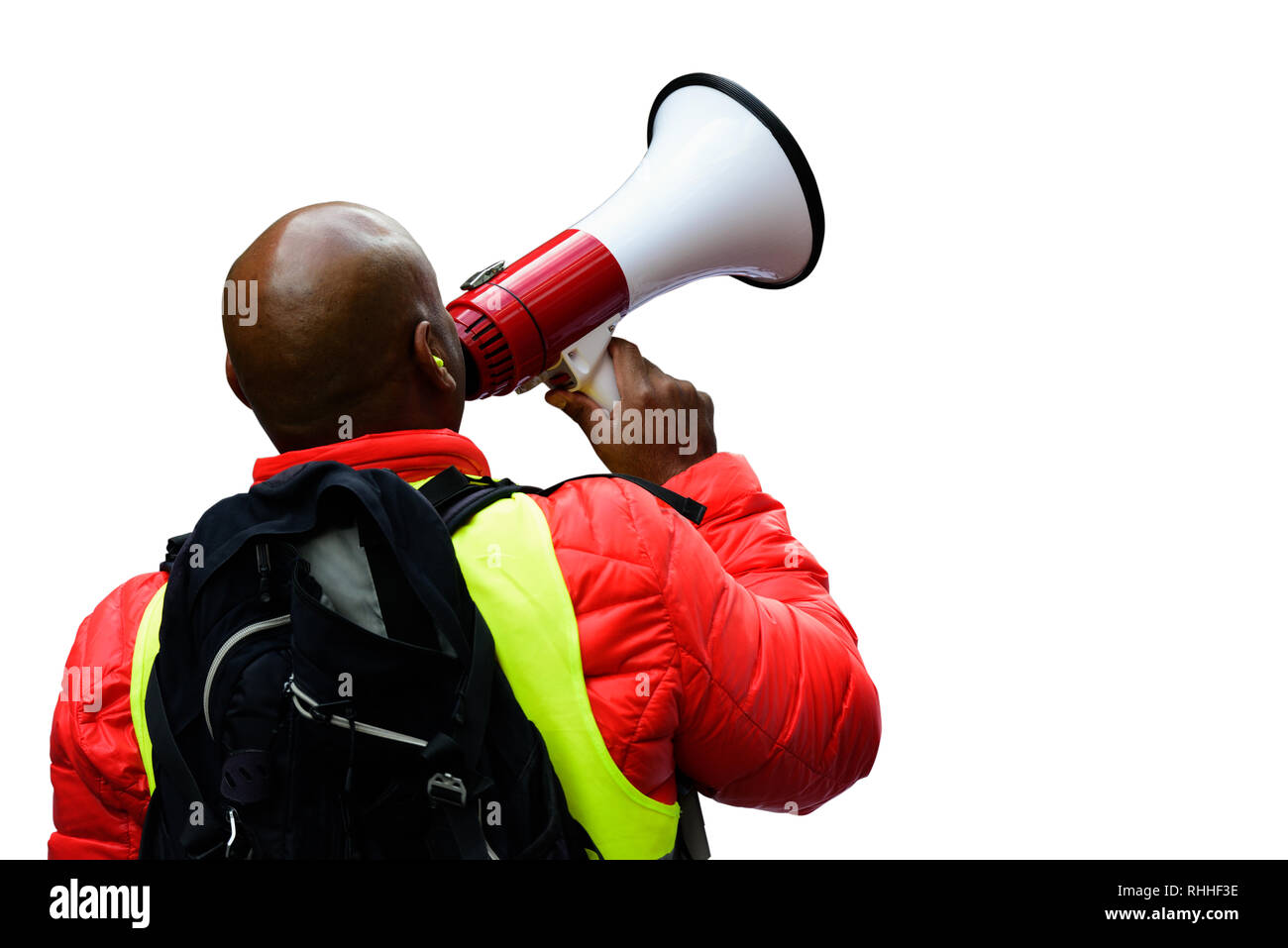 Politischer Aktivist mit dem Megaphon während eines Protestes, isoliert, Image enthält Freistellungspfad Stockfoto