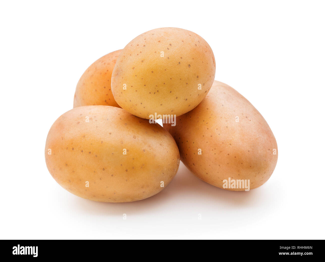 Haufen von frischen, rohen Kartoffeln auf weißem Hintergrund Stockfoto