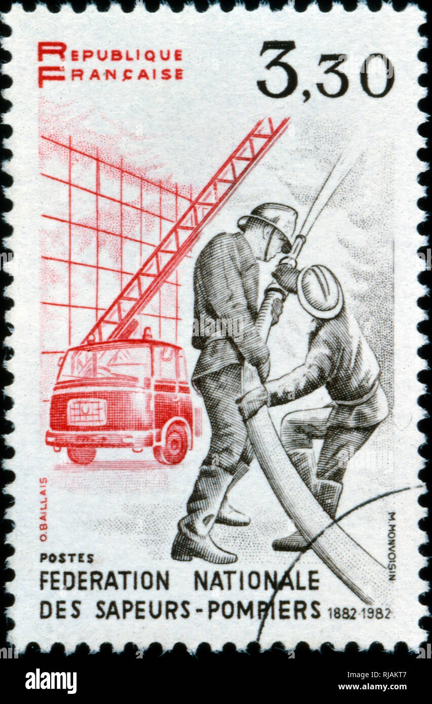 Französische Briefmarke, die Feuerwehrleute. 1982 Stockfoto