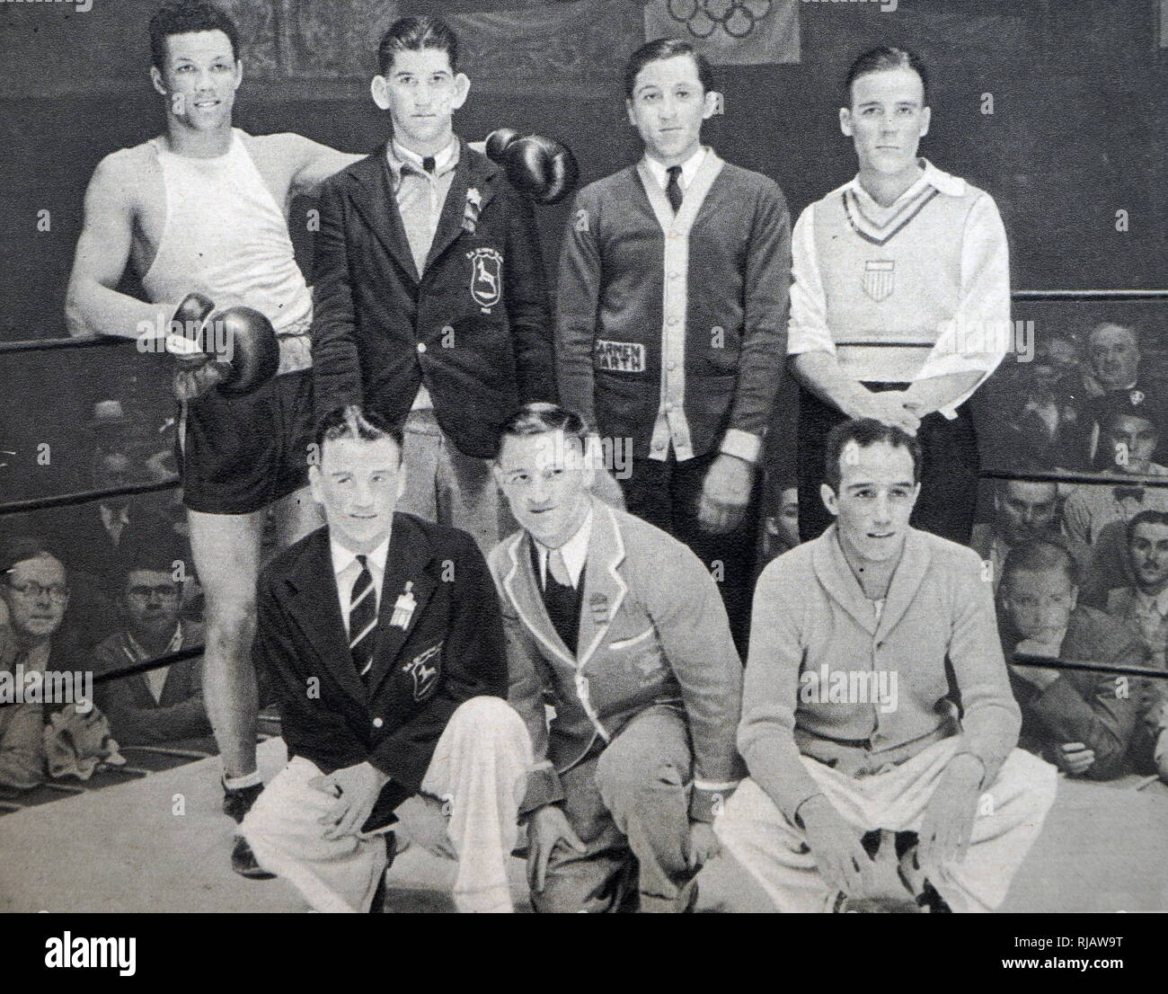 Foto der Gold Gewinner in Boxen zu den Olympischen Spielen 1932. (Von links nach rechts standen) Alberto Santiago Lovell, David Daniel Carstens, Carmine R. Di Bartolomeo Loring & Edward "Eddie" Flynn. Vorne von Links nach Rechts, Lawrence 'Laurie' Stevens, Horace 'Lefty' Gwynne und Carmelo 1305-1306 Robledo. Stockfoto