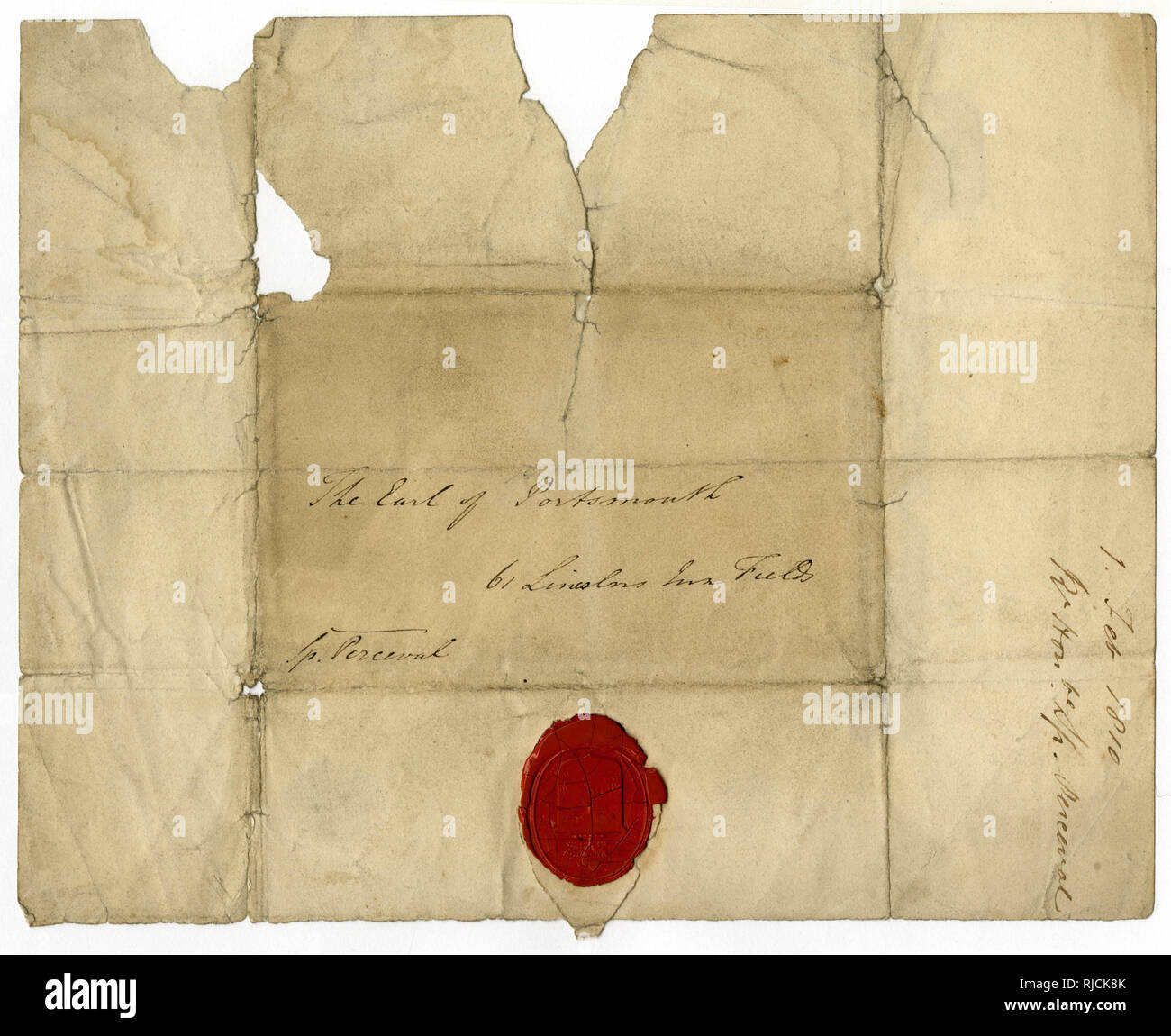 Handgeschriebene Adresse auf einem Brief mit rotem Siegelwachs Stockfoto
