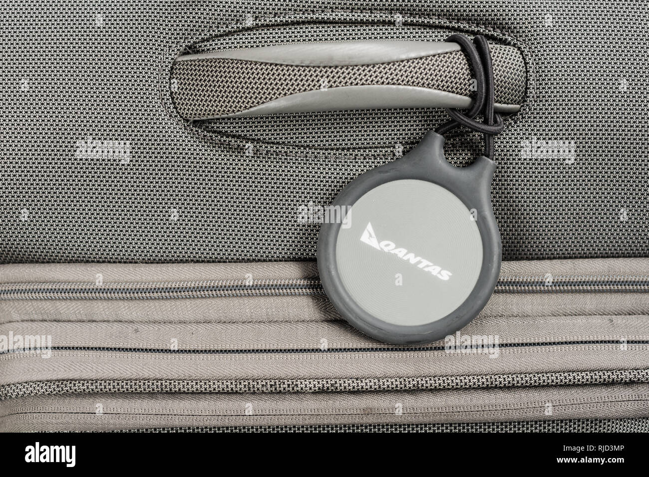 Qantas Smart Tags auf Koffer Stockfoto