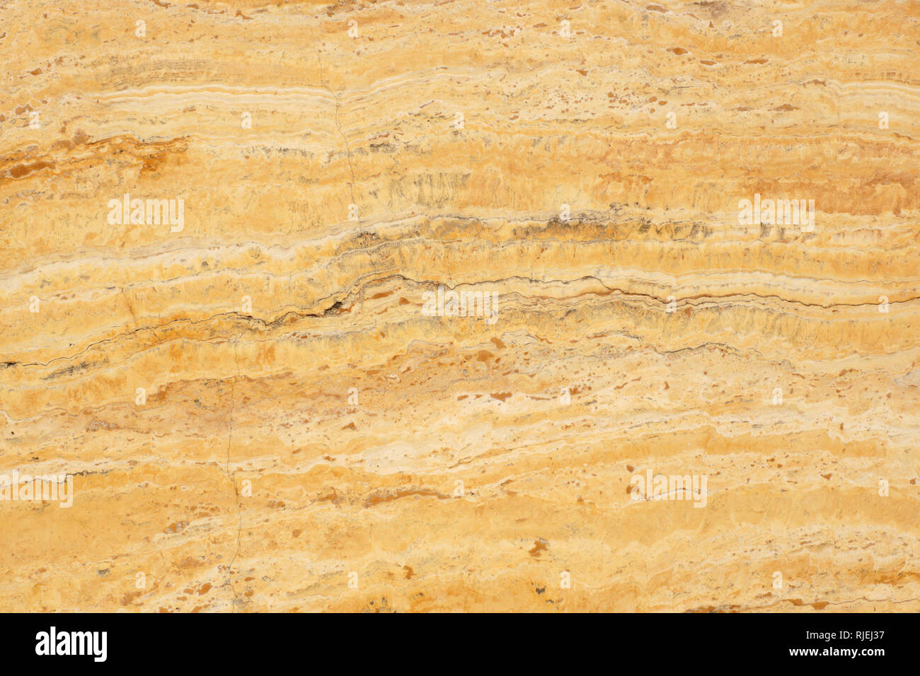 Naturstein Travertin Gelb mit ein interessantes Muster, genannt Travertino Giallo. Stockfoto