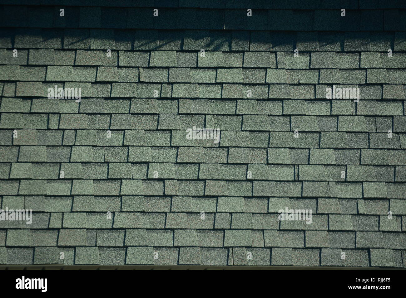 Texturierte grau Asphaltschindeln Hintergrund. Stockfoto