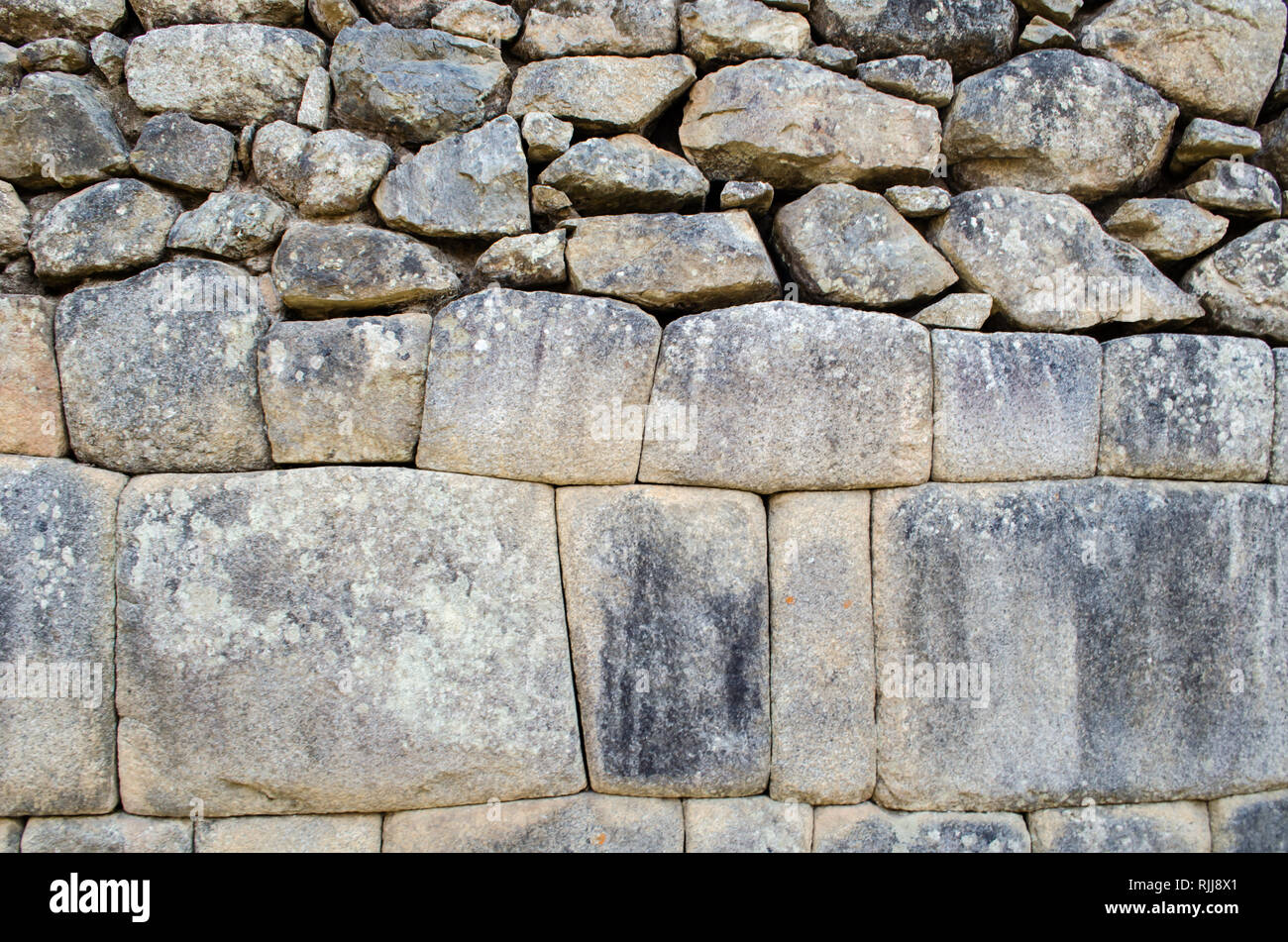 Detail der Inca geschnitzten Steinmauern in Machu Picchu Stockfoto