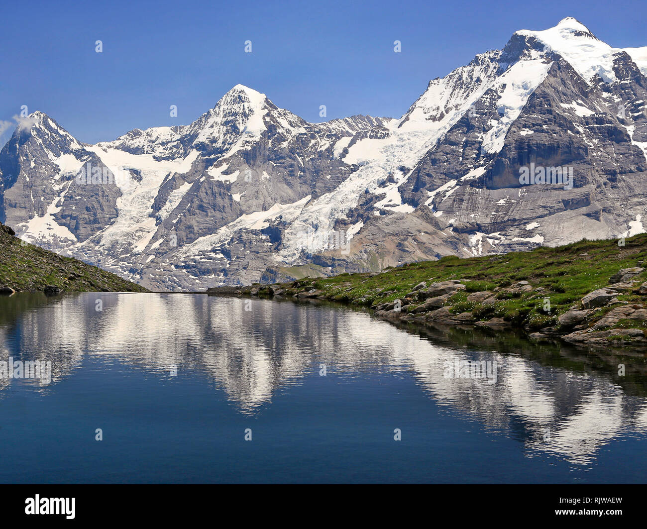 Eiger, Mönch und Jungfrau im Grauseewli See, Schweiz Alpen wider Stockfoto