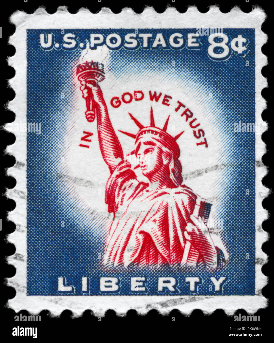 USA - ca. 1958: einen Stempel in den USA gedruckten zeigt die Freiheitsstatue, mit der Inschrift "In God we trust', ca. 1958 Stockfoto
