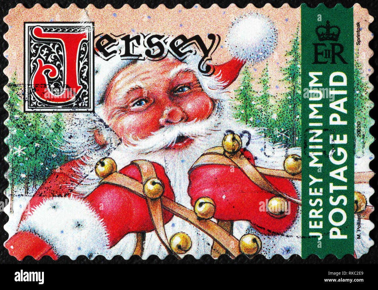 Santa Claus und Jingle bells auf Jersey Stempel Stockfoto