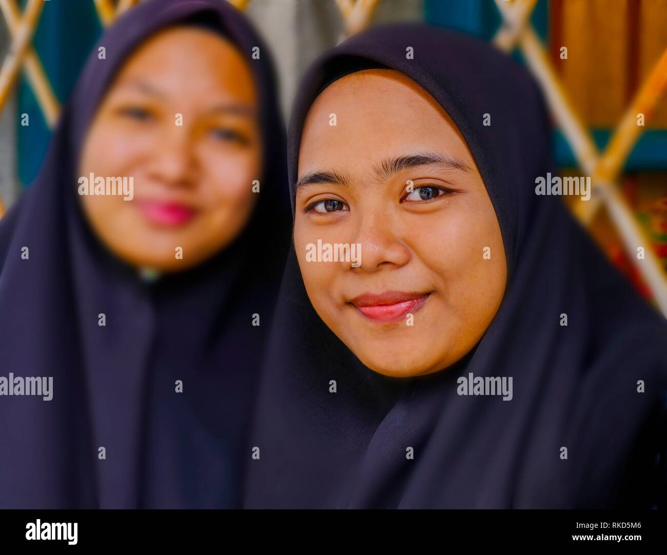 Malaysia, Penang. George Town, muslimischen Mädchen. Stockfoto