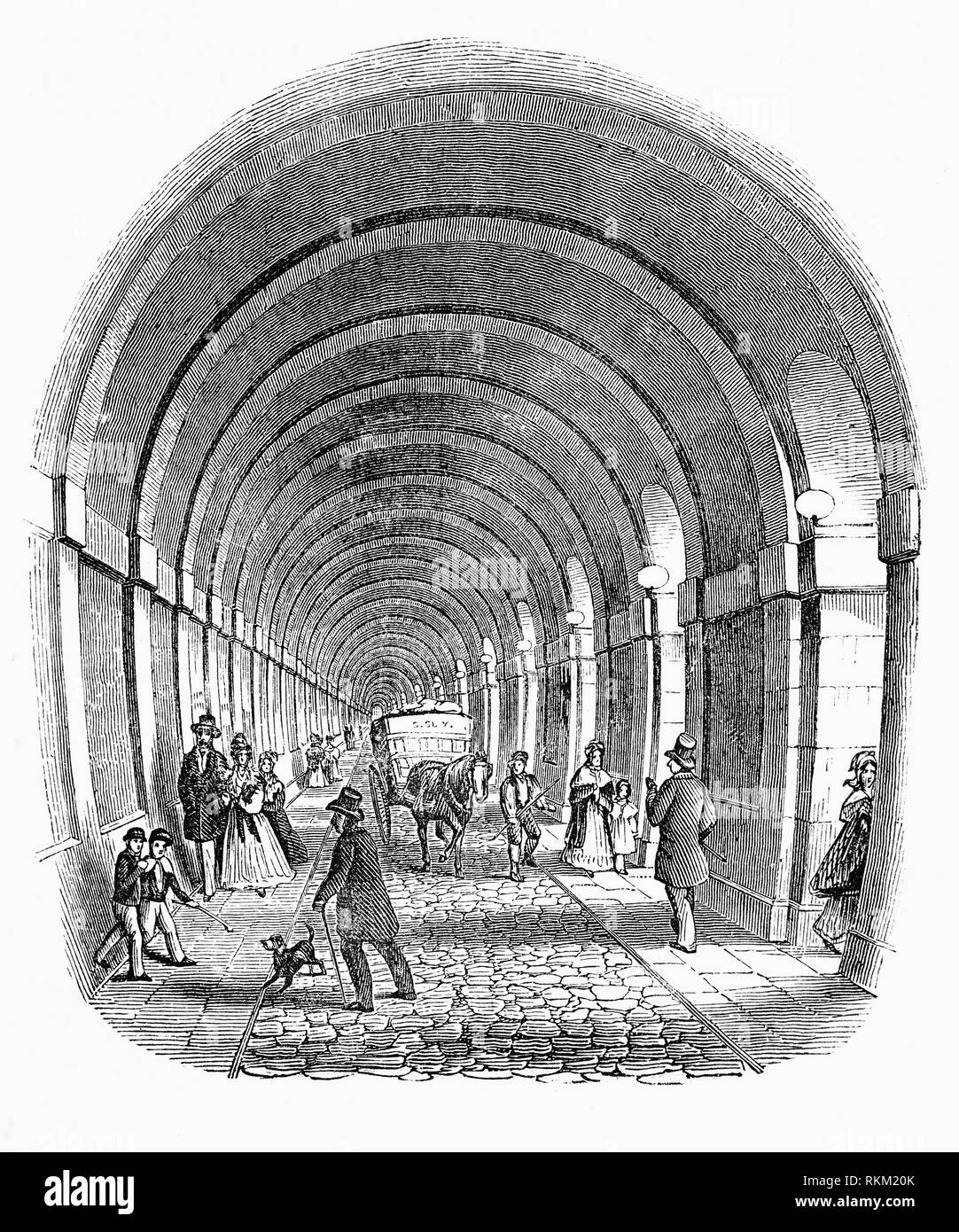 Die Thames Tunnel ist ein Unterwasser Tunnel unter der Themse in London, Anschluss Rotherhithe und Wapping gebaut. Es misst 1.300 Meter lang, in einer Tiefe von 75 Meter unter der Oberfläche bei Flut gemessen. Es war der erste Tunnel bekannt erfolgreich unter einem schiffbaren Fluss gebaut worden, die sich zwischen 1825 und 1843 mit Marc Isambard Brunel's und Thomas Cochrane's neu erfundenen Tunnelling Shield Technologie von Brunel und sein Sohn Isambard Kingdom Brunel gebaut. Es wurde ursprünglich für Pferde entwickelt, Pferdekutschen, war aber nie für diesen Zweck verwendet. Stockfoto