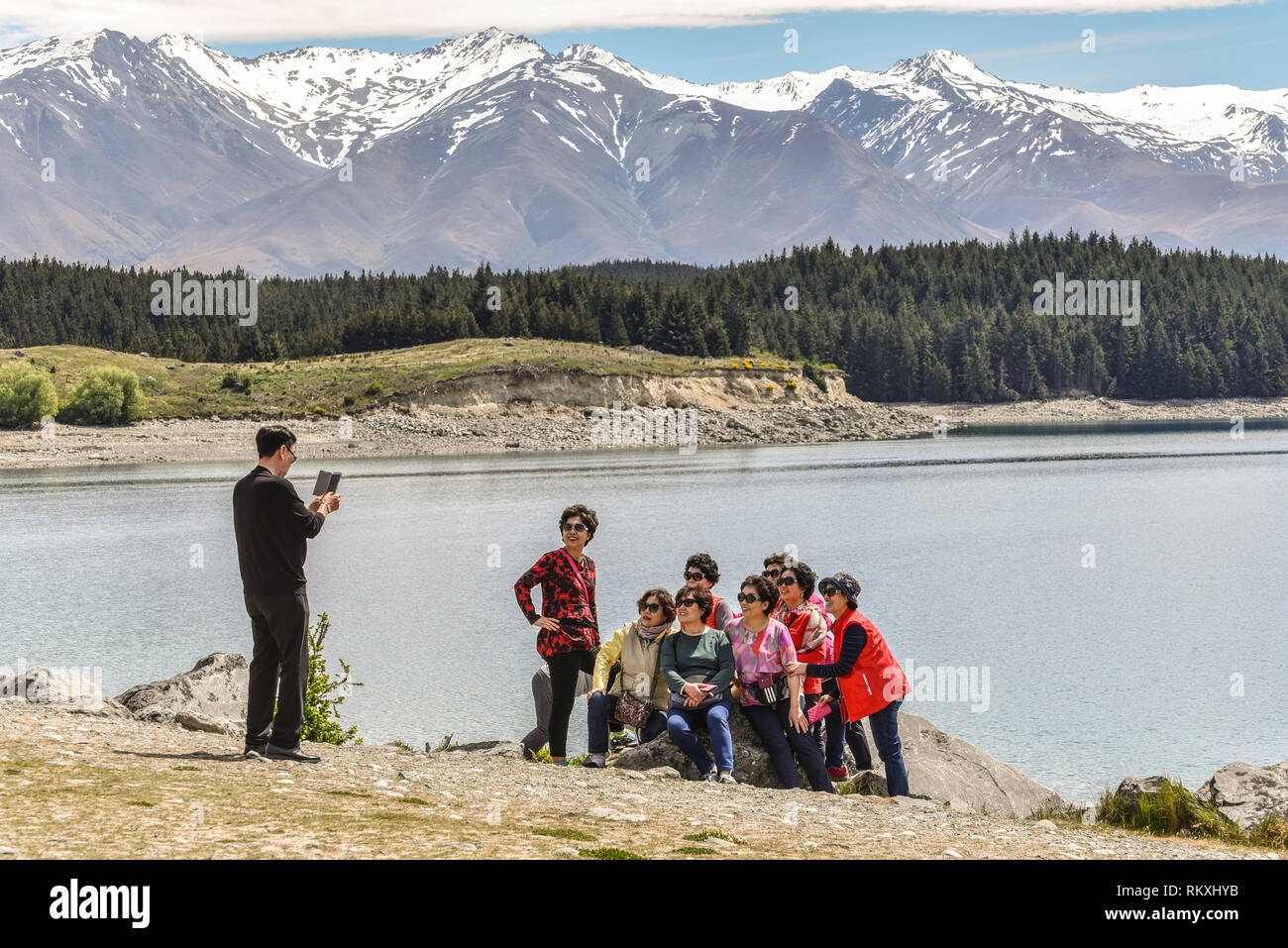 Chinesische Touristen am Lake Pukaki, Neuseeland Stockfoto