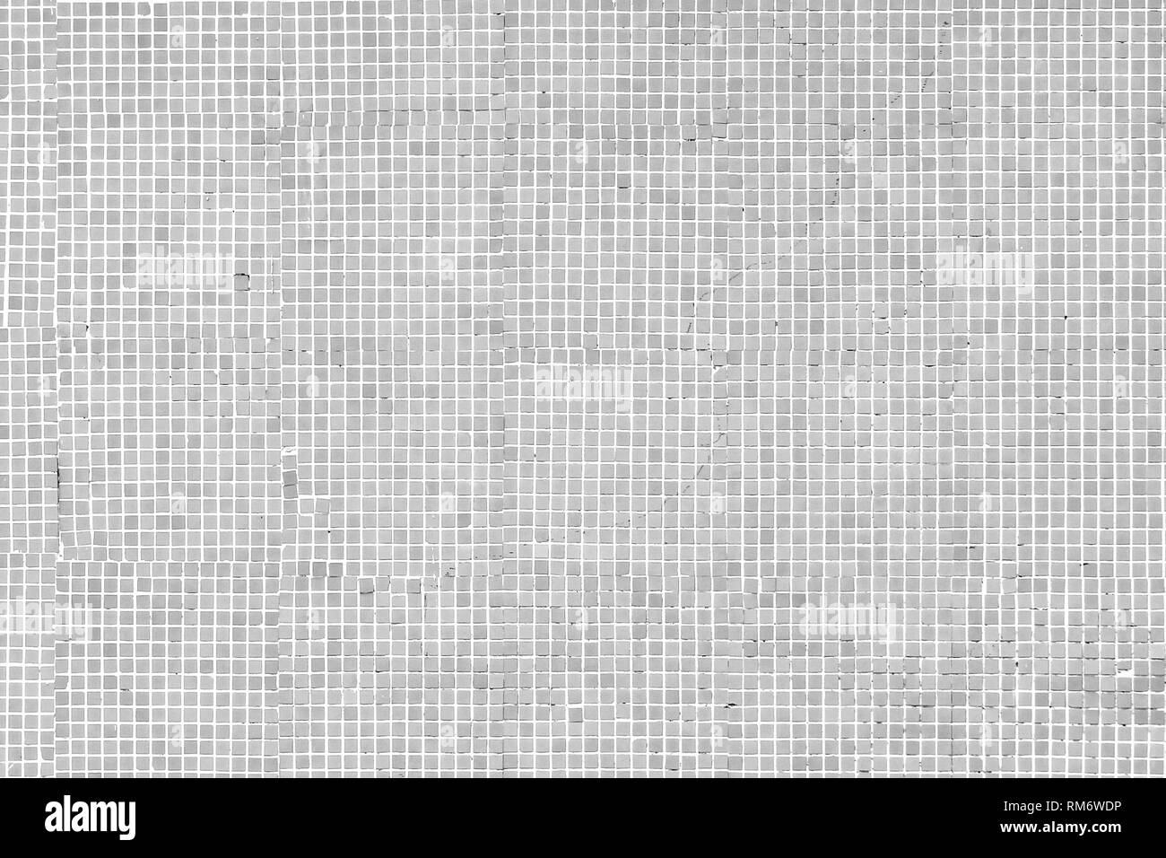 Grau Mosaik Fliesen Wand Textur Hintergrund mit weißen Fugen füllen. Abstrakte Fliese Muster. Stockfoto
