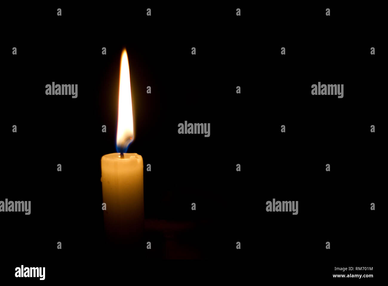 Brennende Kerze Stockfoto