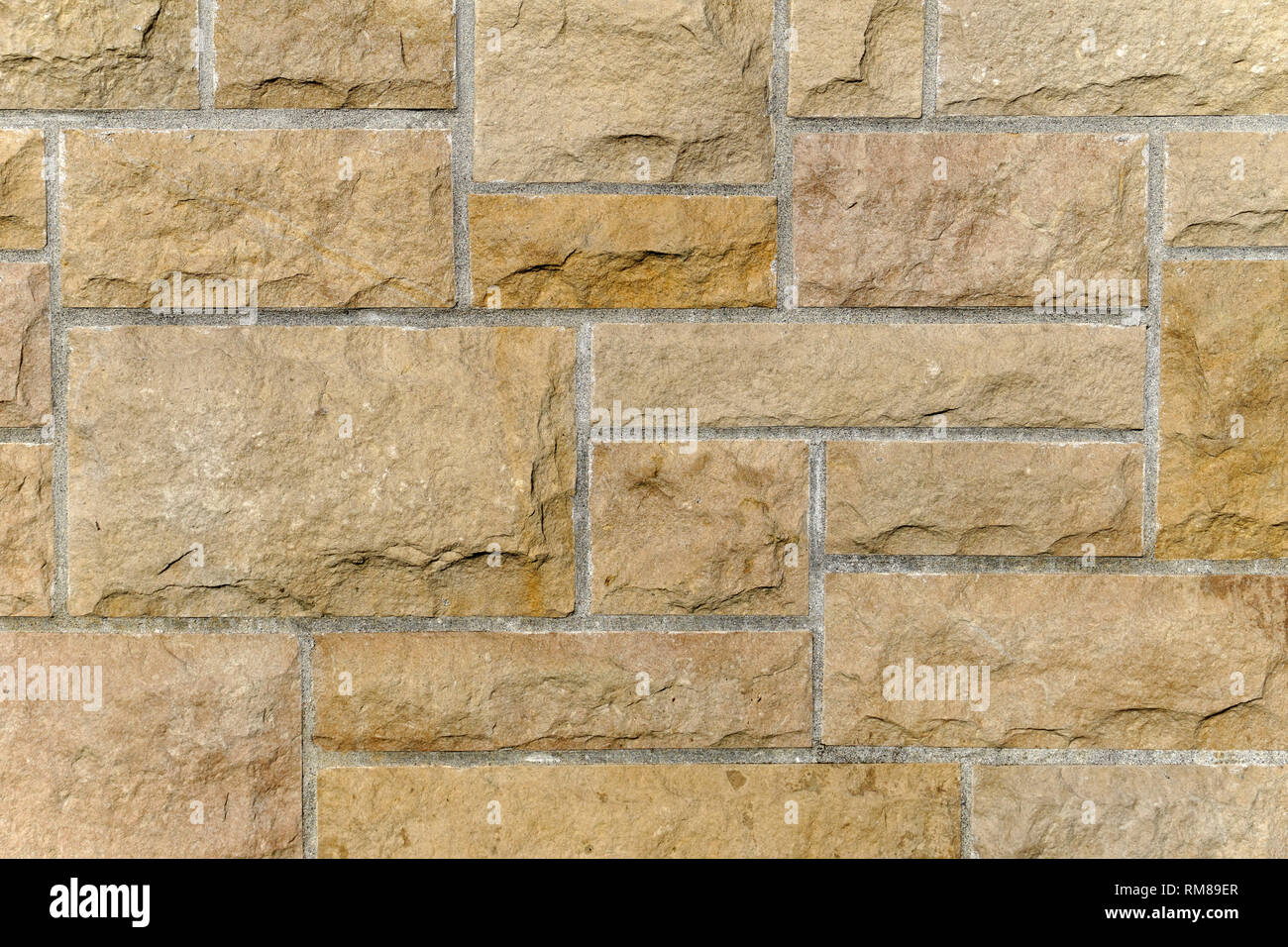 Nahaufnahme einer braunen Wohngebiet modulare Steinmauer Stockfoto