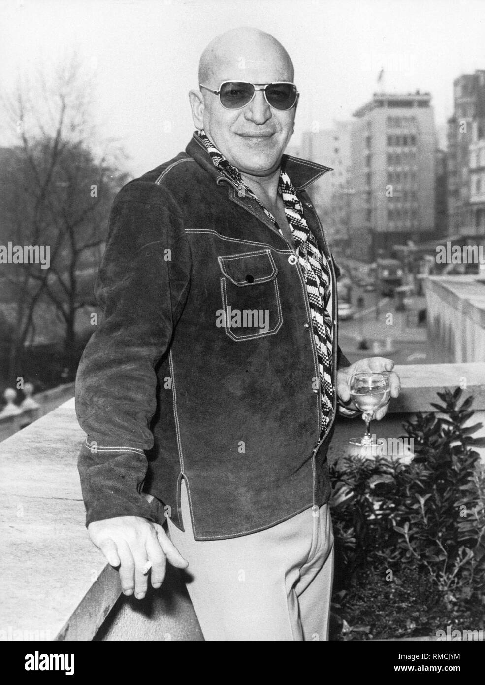 Telly Savalas (1924-1994), ein US-amerikanischer Schauspieler. Undatiertes Foto, vermutlich aus dem Ende der 70er Jahre. Stockfoto