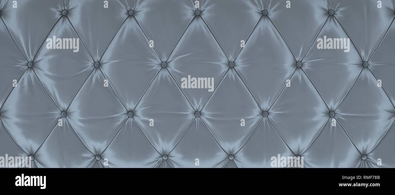 Getuftet grau Sofa Textur Hintergrund Stockfoto