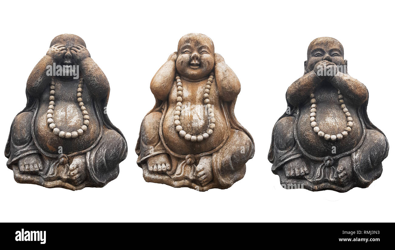 Drei Buddhastatuen in einer Pose der Drei Affen ee, nichts hören, nichts sagen" isoliert auf weißem Stockfoto