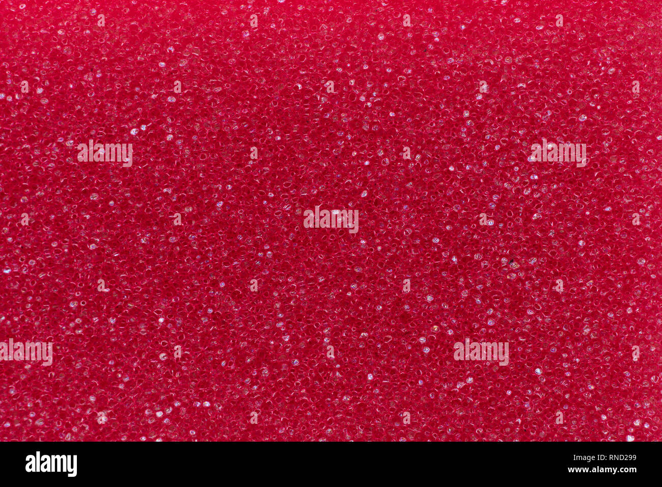 Makro Foto von roten poröses Material für den Hintergrund. Stockfoto