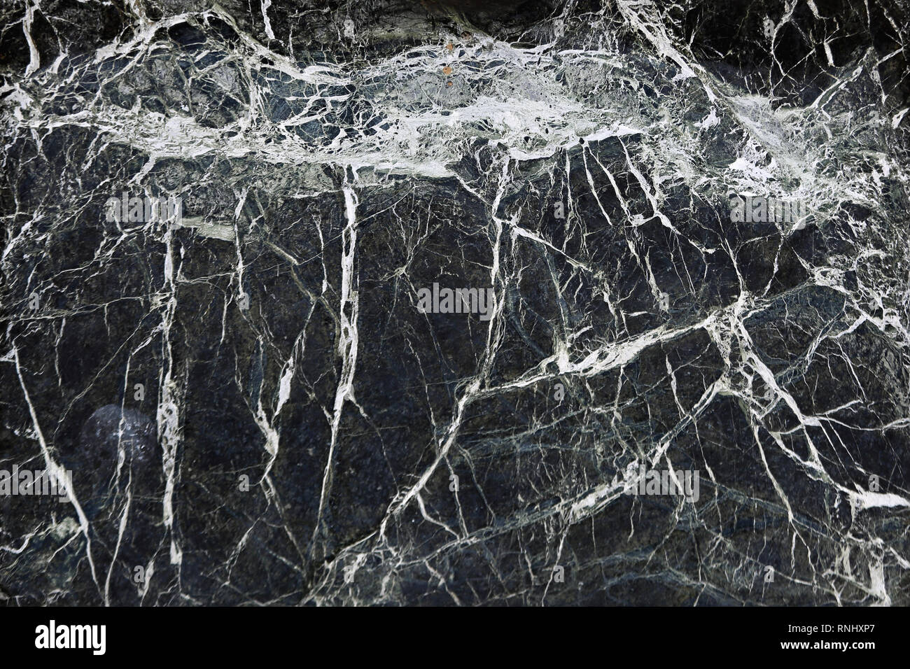 Dunkel schwarz Marmor Stein Fliese mit Adern Stockfoto