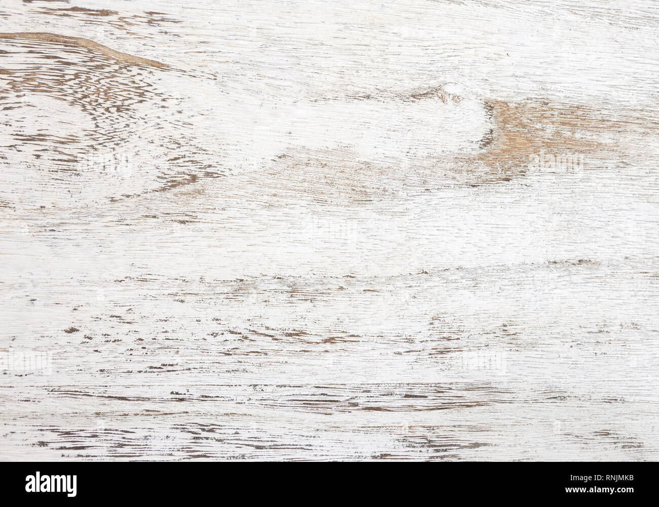Grunge Hintergrund. Abblätternde Farbe an einem alten Holztisch. Holz Textur für weissen Hintergrund. Ansicht von oben. Stockfoto