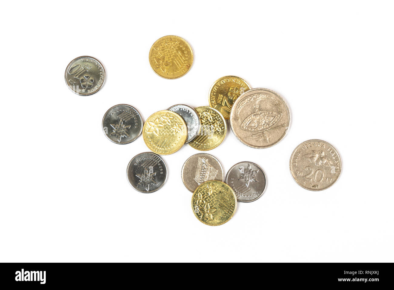 Einige malaysische Ringgit Münzen auf eine weiße Fläche Stockfoto