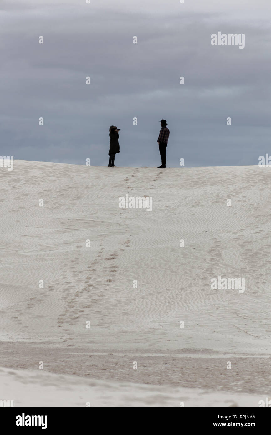 Fotograf auf Sand dune Stockfoto