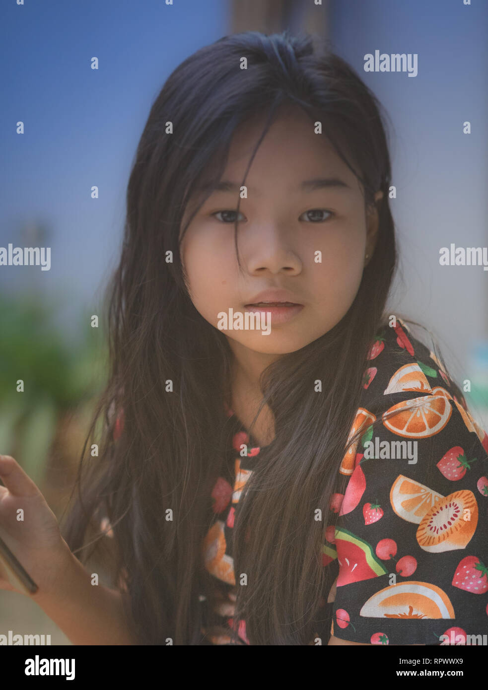 Das Porträt einer hübschen asiatischen Mädchen. Stockfoto