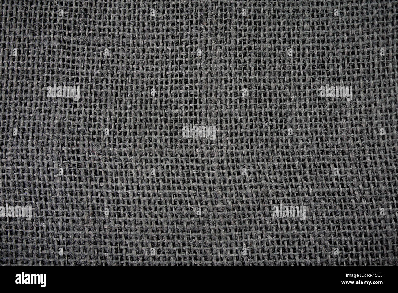 Schwarz gewebt Sackleinen Hintergrund Textur Stockfoto