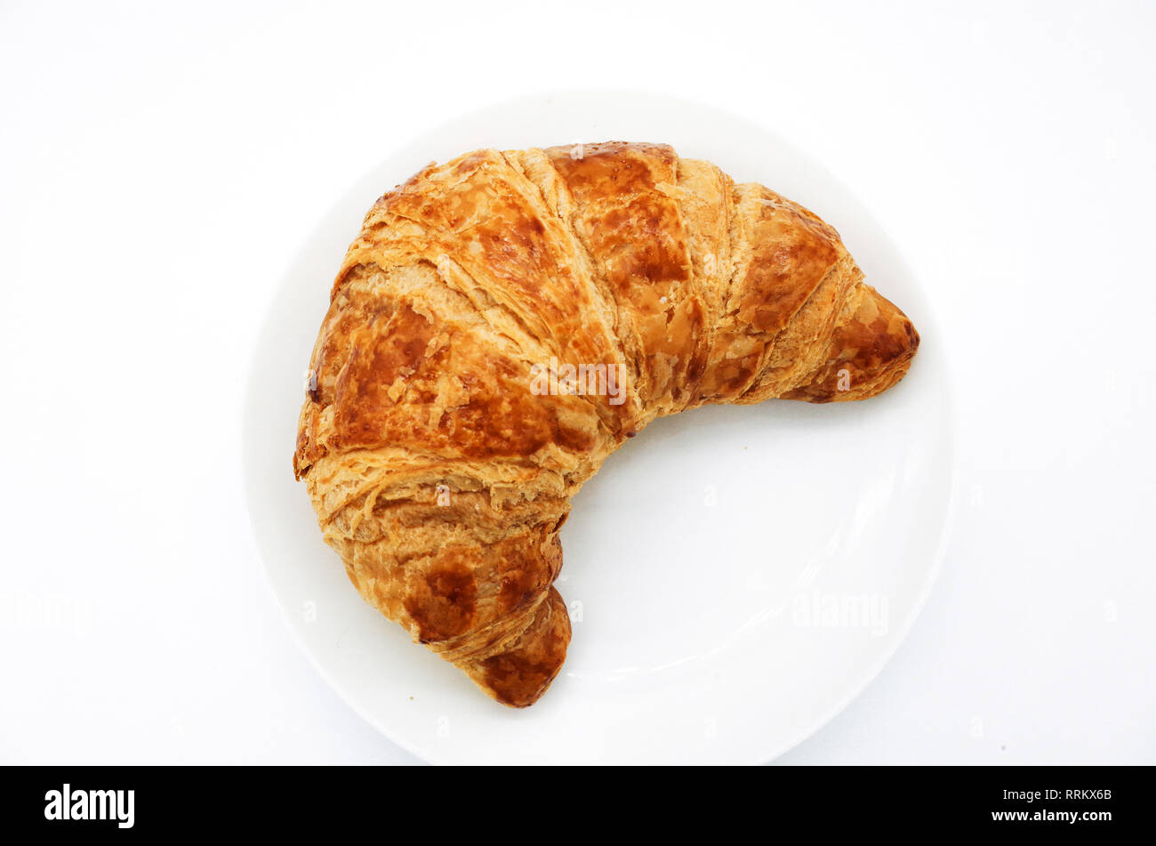 Bäckerei Croissant auf einem weißen Hintergrund. Stockfoto