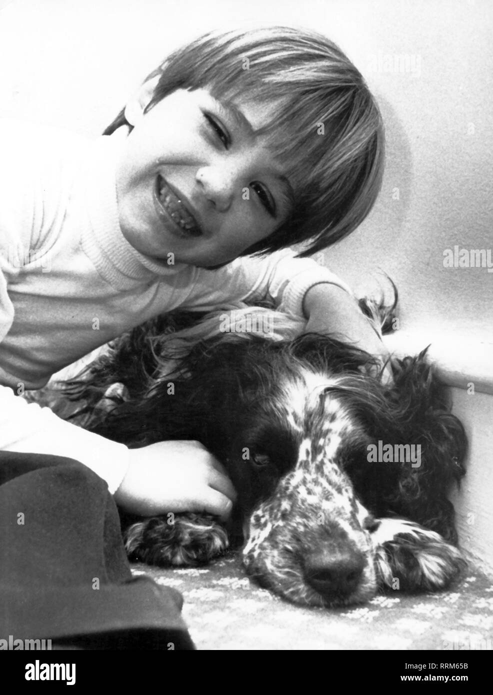 Kennedy, Matthew Maxwell, * 11.1.1965, US-amerikanischer Autor/Verfasser, als Kind mit seinem Hund, der frühen siebziger Jahre, Additional-Rights - Clearance-Info - Not-Available Stockfoto