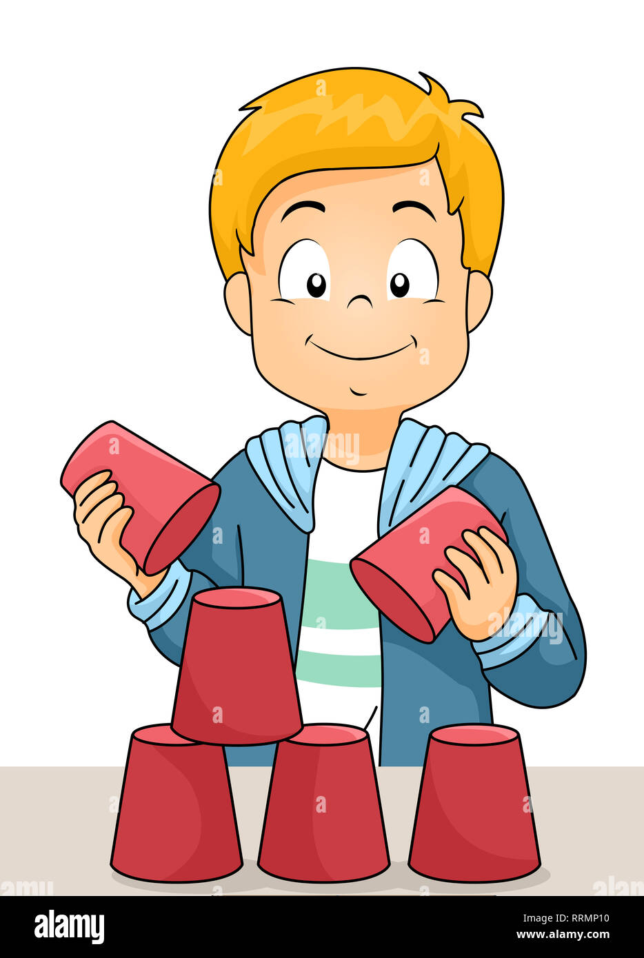 Abbildung: ein Kind Junge spielt mit Pappbechern für eine Pyramide Spiel an einem Team Building Workshop Stockfoto
