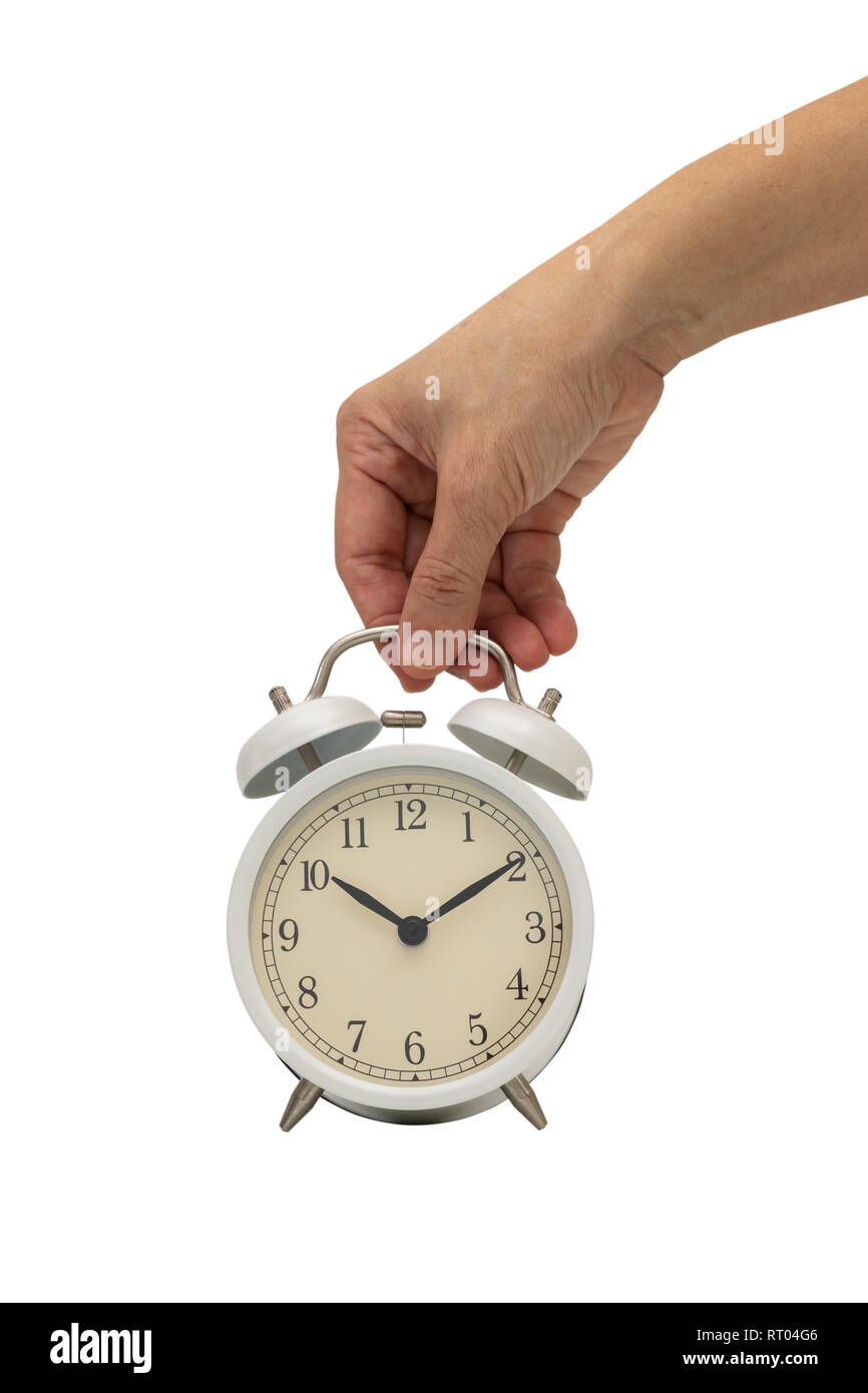 Hand weiß vintage Wecker auf weißem Hintergrund. Stockfoto