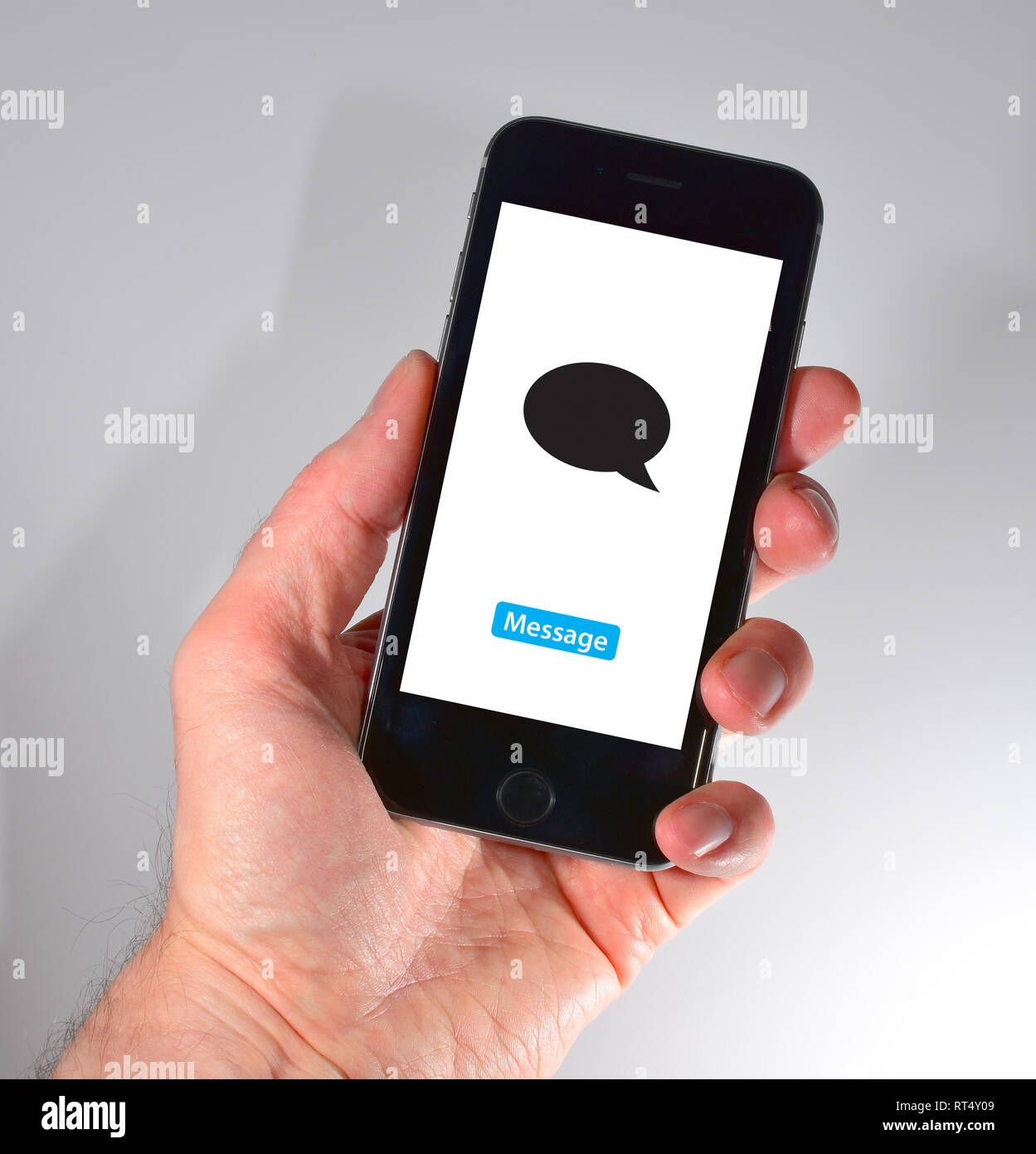 Das iPhone in der Hand gehalten - Nachricht Symbol Stockfoto