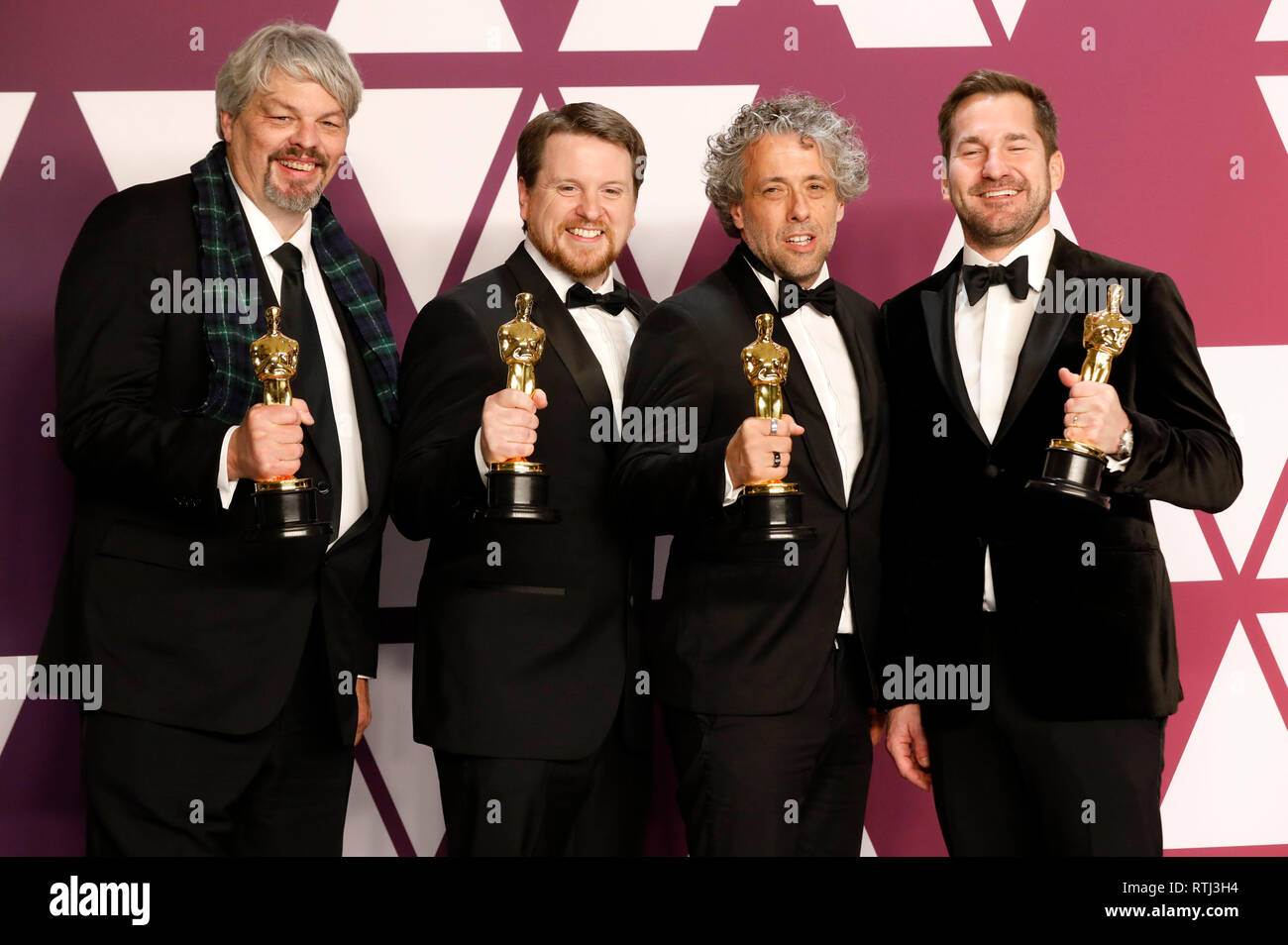 Ian Hunter, Tristan Myles, Paul Lambert und J. D. Schwalm, Gewinner der Beste Visuelle Effekte für die "ersten Menschen", stellen in der Presse Zimmer auf der 91. jährlichen Academy Awards in Hollywood und Highland Center am Februar 24, 2019 in Hollywood, Kalifornien. Stockfoto