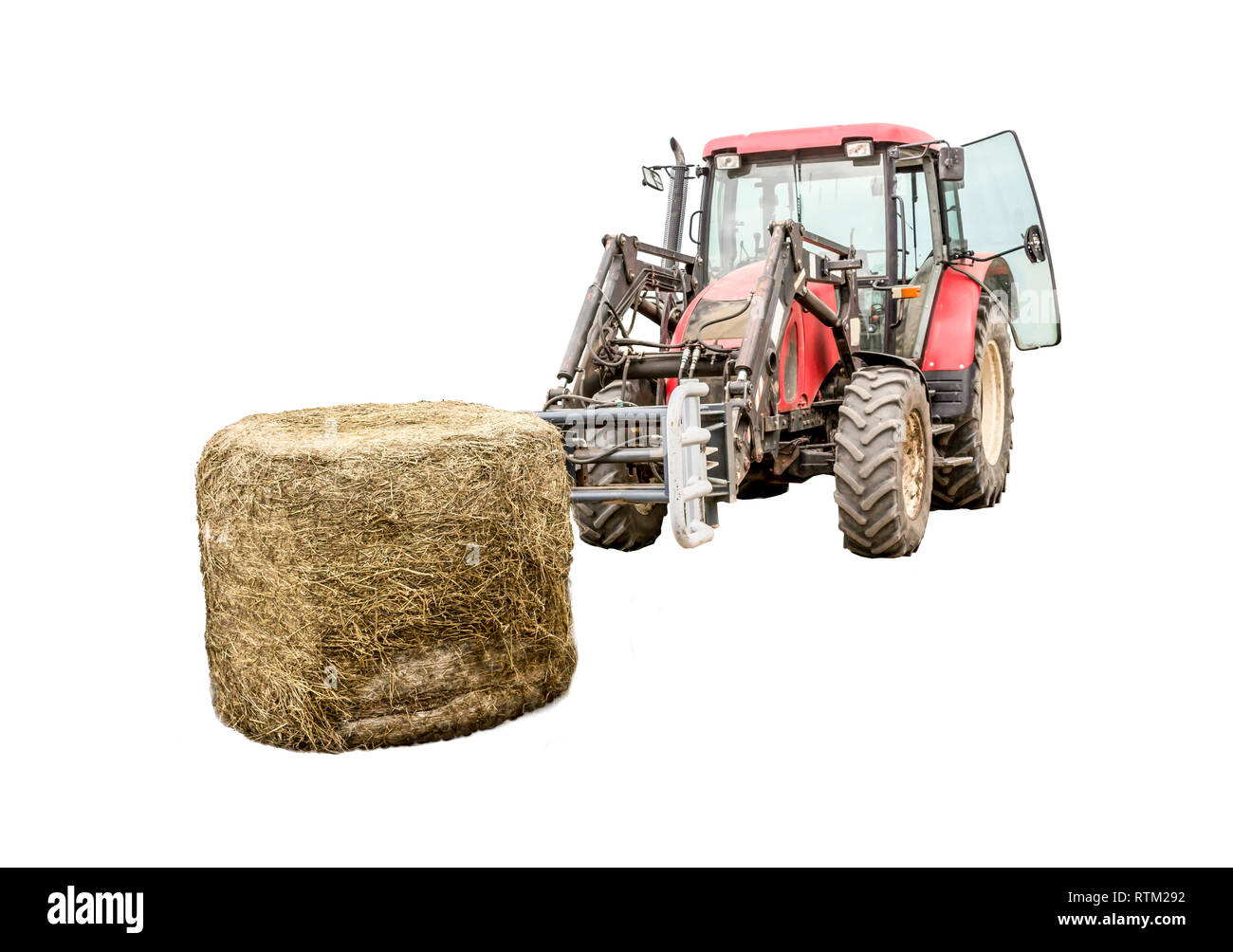 Von der Membran ein silageballen und einem Traktor, der mit einem Gabelstapler ausgepackt. Isoliert Foto. Notwendige Ausrüstung für eine Molkerei. Stockfoto