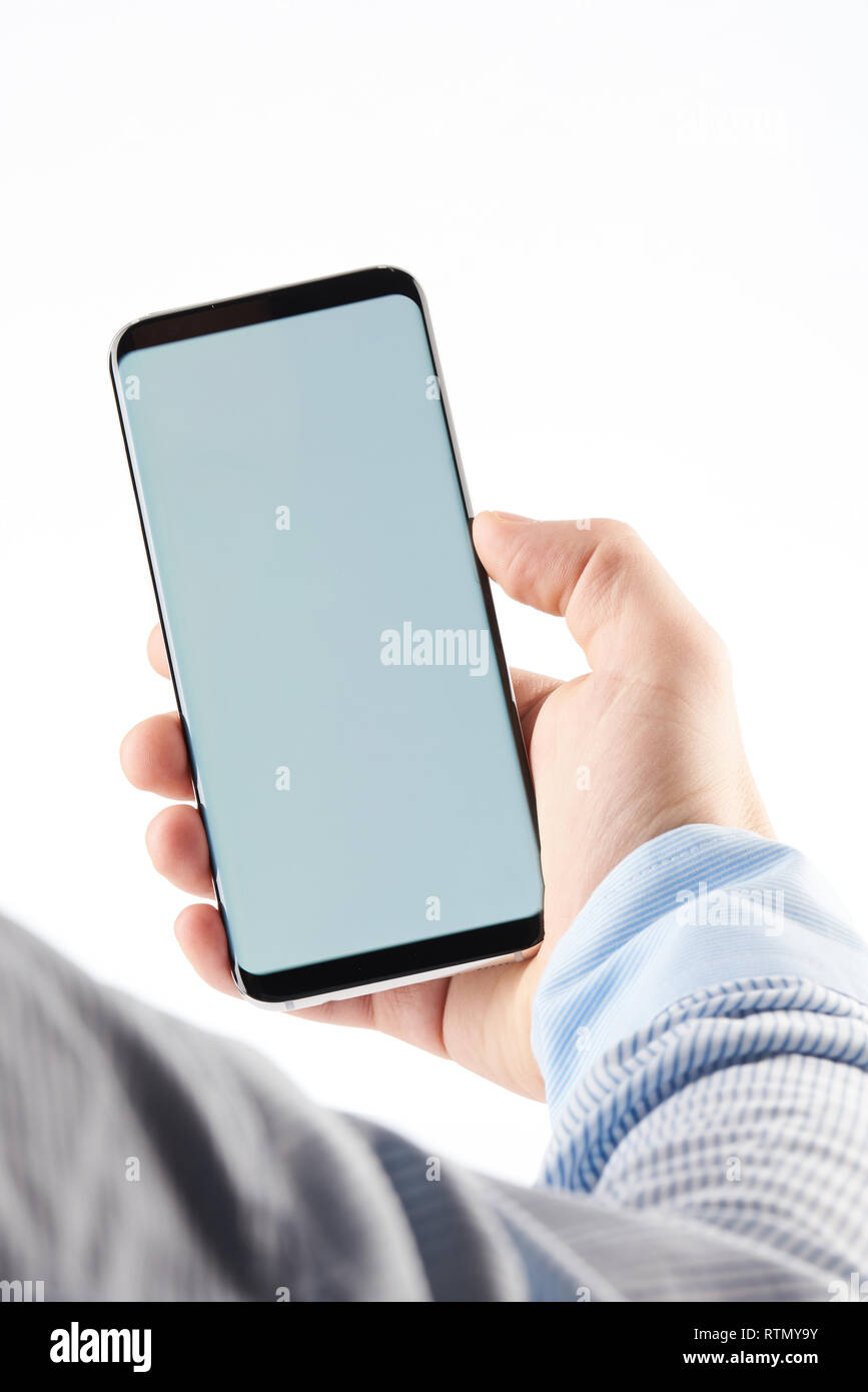 Business Mann smartphone Close-up auf weißem Hintergrund Stockfoto