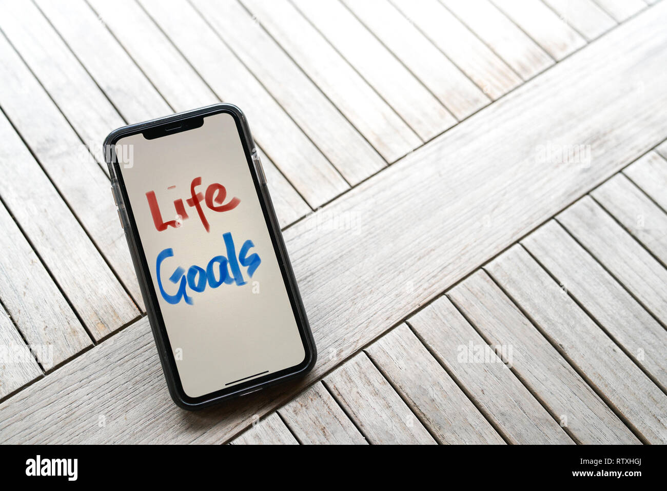 Smart Phone mit Text, Lebensziele geschrieben Stockfoto