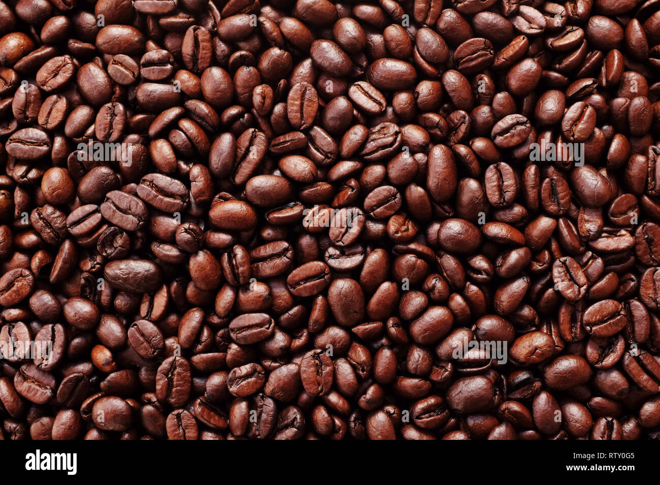 Meer der reichen Braun gerösteten Kaffeebohnen als abstrakter Hintergrund Textur Stockfoto