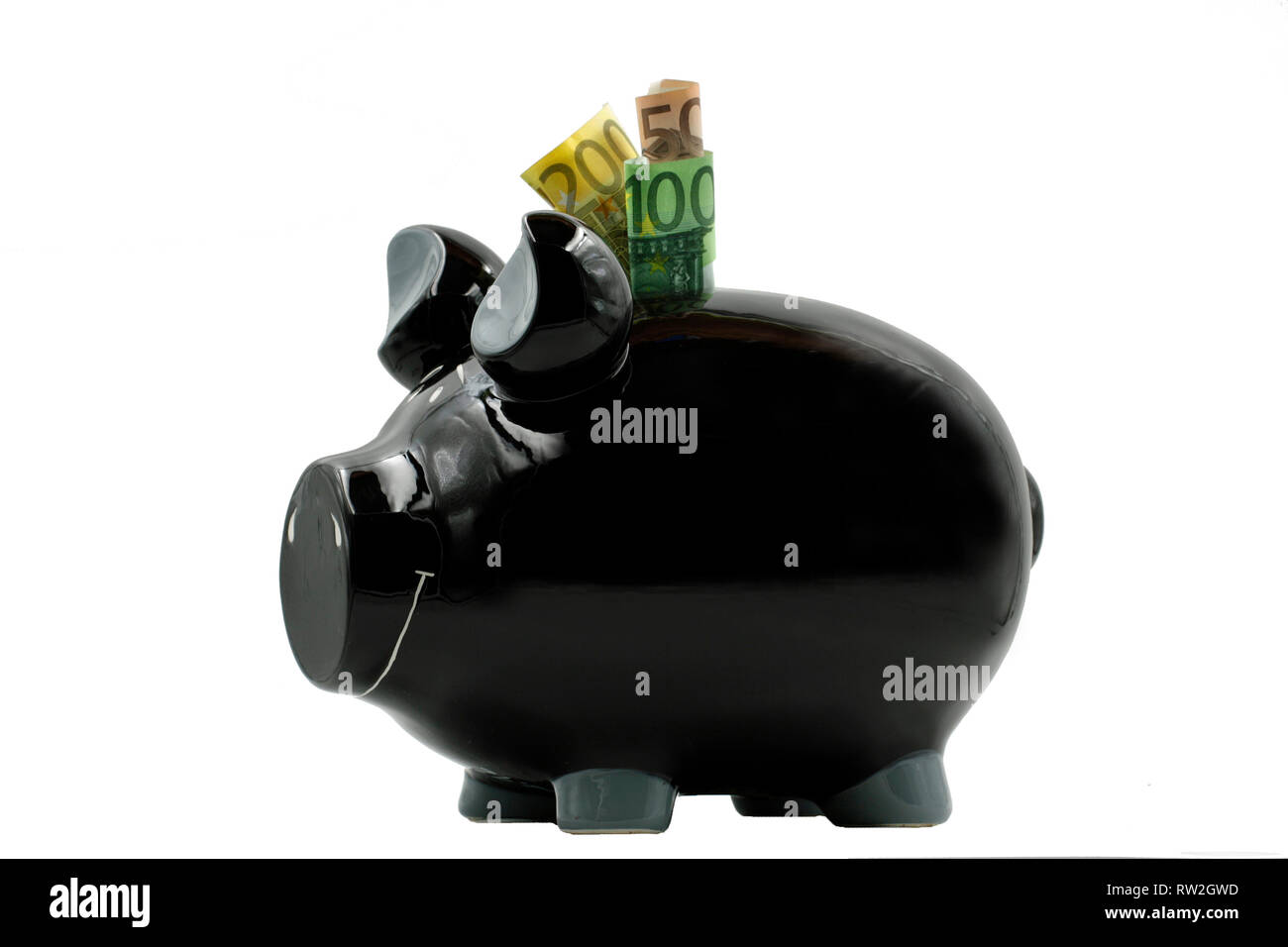 Schwarz Sparschwein mit Euro-banknoten auf weißem Hintergrund Stockfoto