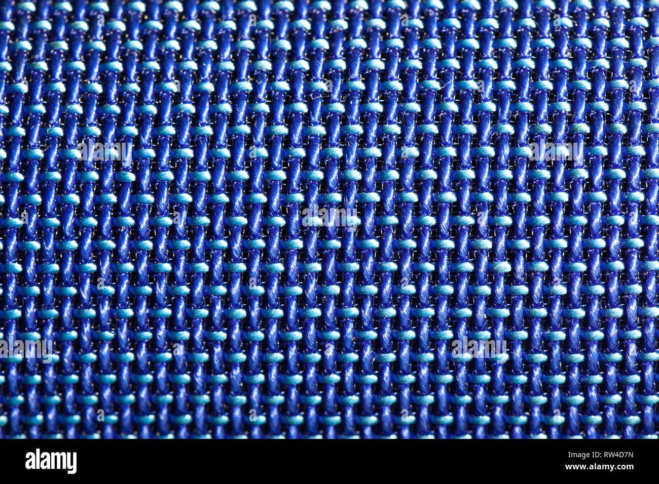 Blau symmetrische Textur von synthetischen Fasern. Stockfoto