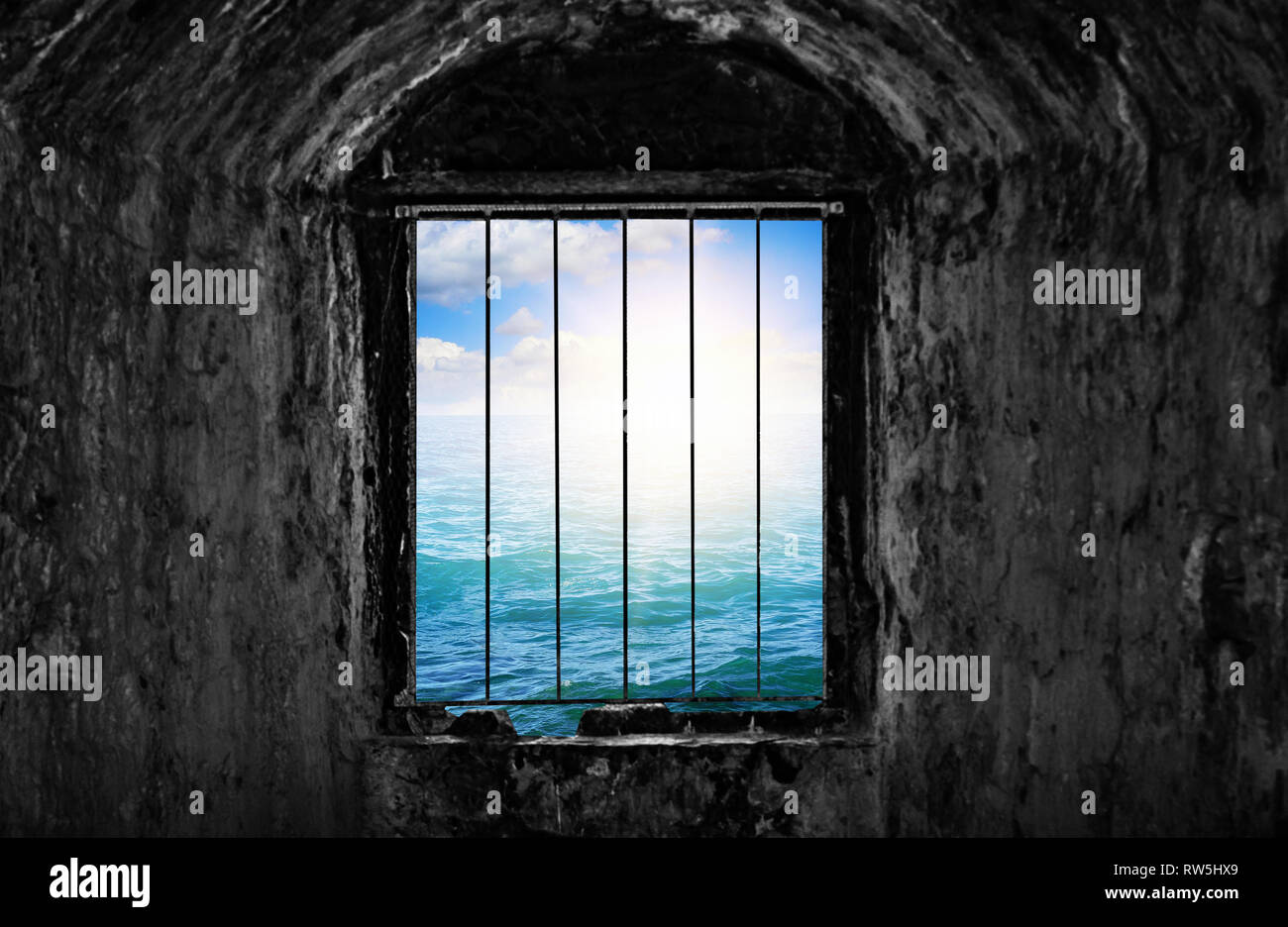 Dungeon mit Fenster und Bars. Stockfoto