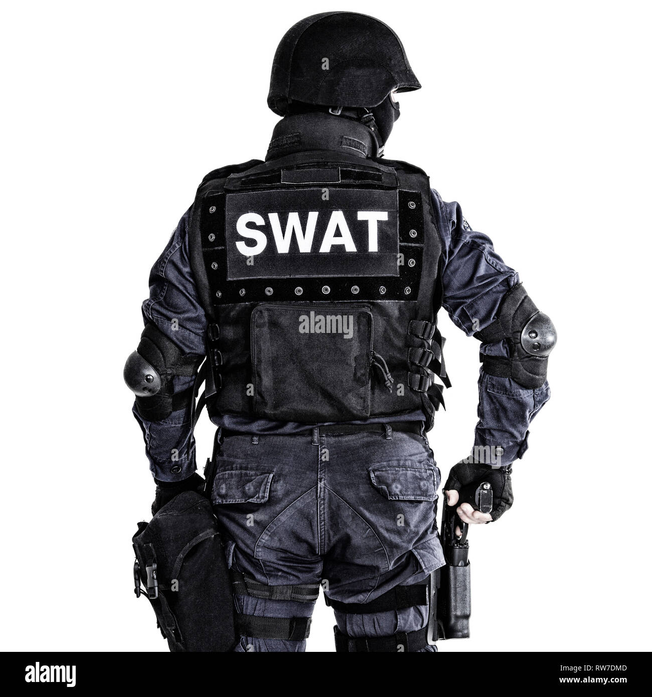 Spezielle Waffen und Taktiken (SWAT) Team officer Schuß von hinten. Stockfoto
