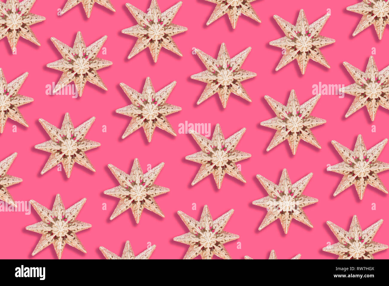 Holiday Star Muster auf rosa Hintergrund - Flach Stockfoto