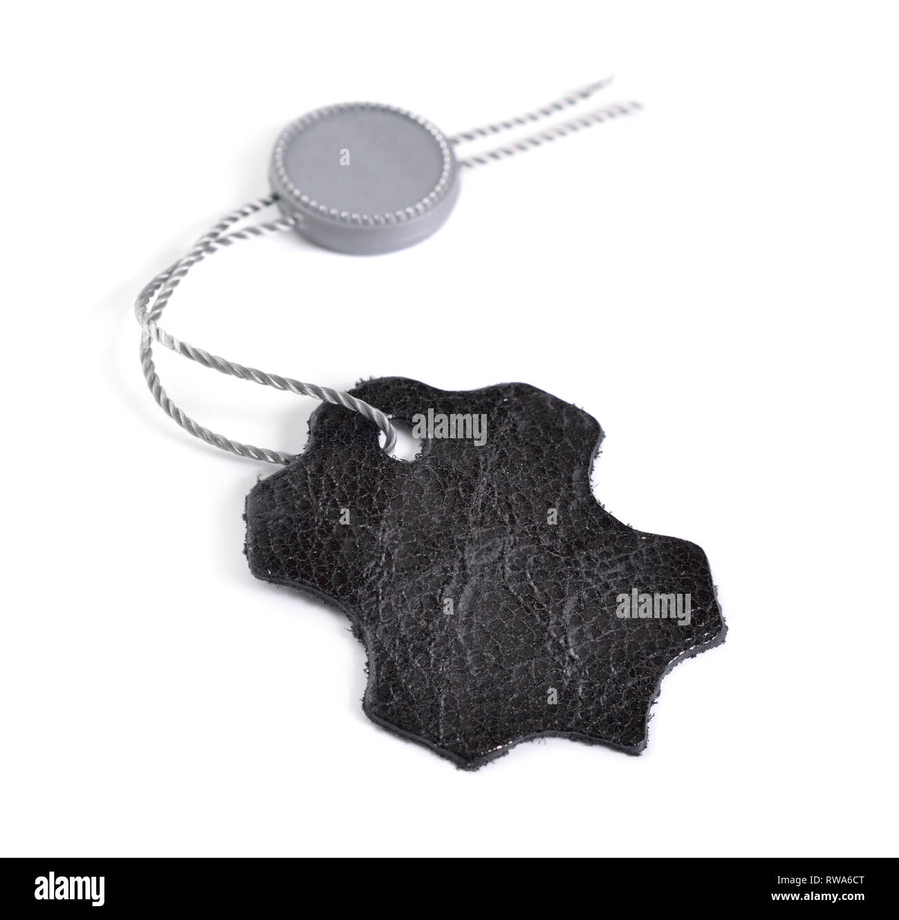 Schwarz Leder label Tag auf weißem Hintergrund, Stockfoto