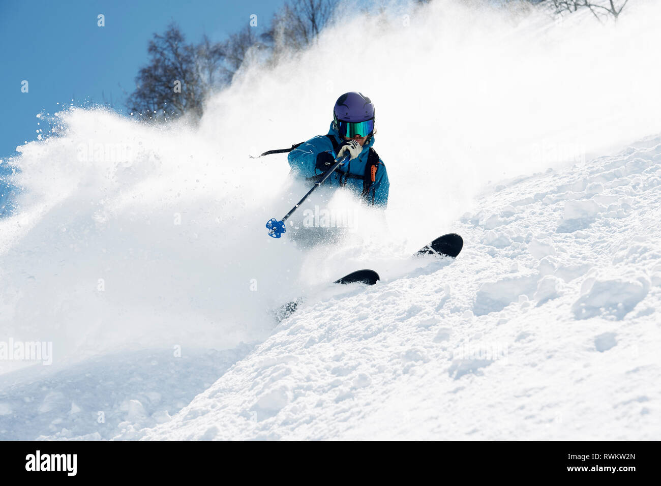 Männliche Skifahrer effet Skifahren, Berg, Alpe-d'Huez, Rhône-Alpes, Frankreich Stockfoto