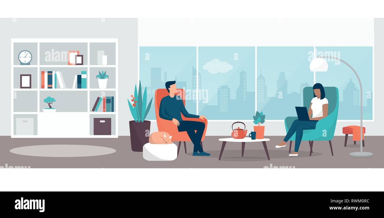 Paar entspannt zu Hause auf dem Sessel im Wohnzimmer, die Frau, die mit ihrem Laptop, Lifestyle und Interior Design Konzept ist Stock Vektor