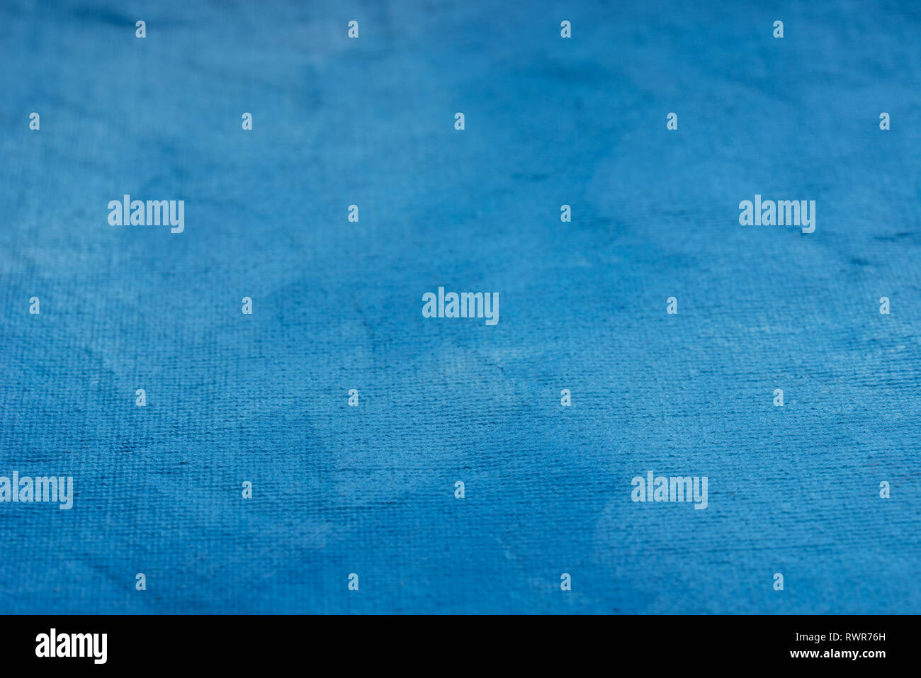 Blau lackiert künstlerischen Leinwand Hintergrund Textur selektiven Fokus Makro Stockfoto